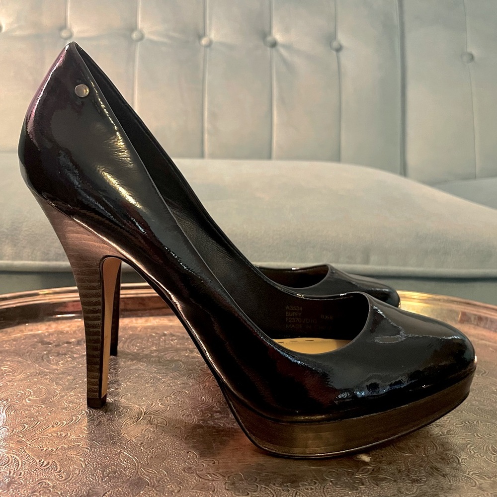 Coach black patent pumps